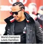  ??  ?? World champion Lewis Hamilton