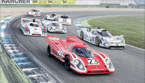  ??  ?? SUCCESS: A line-up of Porsche’s Le Mans winners. In front is the famous red 917.