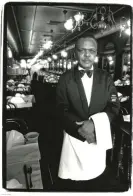  ??  ?? Aston Robinson – Waiter, Gage & Tollner, photograph­ed in Harvey Wang’s New York. ‘Gage & Tollner had closed in 2004, but last year was planning to reopen under new management, just as the pandemic closed all businesses. It has survived, and is going to have another reopening in April.’ Photograph: Harvey Wang