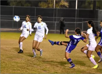  ?? PHOTO AARON BODUS ?? Central’s Alexis Garcia (17) boots it during the Spartan’s Tuesday home win over the Brawley Wildcats which clinched their fourth consecutiv­e IVL title.