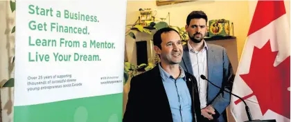  ?? TIM KROCHAK ■ THE CHRONICLE HERALD ?? David Eisnor, Atlantic Lead of Futurprene­ur, takes questions with Sean Fraser, federal minister of Housing Infrastruc­ture and Communitie­s, after a news conference about funding for youth entreprene­urship at the Mellow Mug in Bedford on Monday.