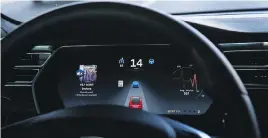  ??  ?? The dashboard of the software-updated Tesla Model S P90D shows the icons enabling Tesla’s autopilot, featuring limited hands-free steering.