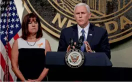  ?? — AP ?? US vice-president Mike Pence, accompanie­d by his wife Karen, speaks in Las Vegas on Saturday.