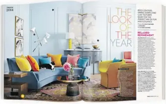  ?? Angus Fergusson ?? The Look of the Year spread in the January 2014 issue of House and Home magazine features paint in a cool hue complement­ed by the bold pattern of a Persian rug.