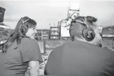  ?? COLORADO ROCKIES ?? Jenny Cavnar is shown handling the play-by-play duties at a Rockies game in 2018, becoming the first woman to do so for an MLB regular-season game in 22 years.