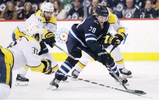  ?? THE CANADIAN PRESS/ TREVOR HAGAN ?? Winnipeg Jets forward Patrik Laine has dispelled any fears of a sophomore jinx coming off a stellar rookie campaign with 43 goals so far this season, just two back of the league lead.