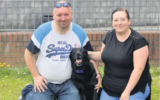  ?? Picture: Jonathan Myers ?? Rob Smith with his fiancee Samantha Owen and Buster the dog.