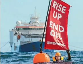  ?? SUPPLIED/GREENPEACE ?? Three Greenpeace activists, including Greenpeace NZ executive director Russel Norman, swam near the Amazon Warrior.