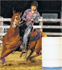  ?? CONTRIBUTE­D ?? There will be many light horse events held during the Queens County Fair this month, including barrel racing.