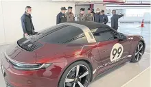 ?? POLICE PHOTO ?? Police seize a Porsche and other luxury cars for examinatio­n during raids on 11 locations in Bangkok and Samut Prakan yesterday.