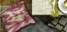  ?? HOME SENSE ?? Cushions and throw blankets: An easy, affordable way to stay current without a major change or investment. And a subtle, elegant way to introduce pink is through the playful use of pattern. This coarse-weave cushion in a classic Ikat fabric, from...