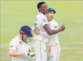  ?? REUTERS ?? ■
Kagiso Rabada (left) was the highest wicket-taker for South Africa, returning 4/103, as the hosts beat England by 107 runs in the first Test in Centurion on Sunday.