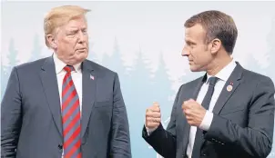  ?? AP ?? President Donald Trump meets French President Emmanuel Macron during the G7 summit.