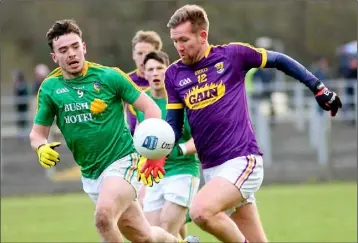  ??  ?? Influentia­l attacker P.J. Banville shows a clean pair of heels to Leitrim midfielder Dean McGovern.