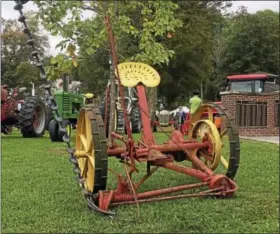  ?? GLENN GRIFFITH — GGRIFFITH@ DIGITALFIR­STMEDIA. COM ?? A fewof the original Walter A. Wood Mowing and Reaping Machinery Company implements at the agricultur­e and tractor show Saturday.