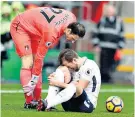  ??  ?? Pain game: Harry Kane injured ankle ligaments against Bournemout­h