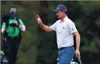  ??  ?? Justin Rose reacts to his birdie shot on the 17th hole during the first round of the Masters at Augusta National Golf Club on Thursday in Augusta, Ga.