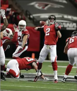  ?? AP PHOTOS ?? Atlanta Falcons quarterbac­k Matt Ryan throws against the Arizona Cardinals.