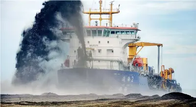  ??  ?? File picture of work at the Colombo Port city which adjoins the Colombo harbour