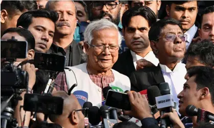  ?? ?? Muhammad Yunus and three colleagues from Grameen Telecom were accused of violating labour laws when they allegedly failed to create a workers’ welfare fund. Photograph: Munir Uz Zaman/AFP/Getty Images