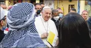  ?? ANDREW MEDICHINI / AP ?? Pope Francis visits the Chaldean Cathedral of Saint Joseph in Baghdad, Iraq, on Saturday. Earlier, he met with Grand Ayatollah Ali al-Sistani.