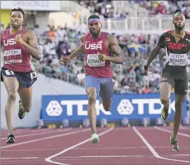 ?? Ashley Landis Associated Press ?? NOAH LYLES, left, running a 200 semifinal at the world championsh­ips this week, anchored the American men’s last 400-meter relay victory, in 2019.