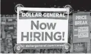  ?? Charles Krupa / Associated Press ?? A Dollar General store in Methuen, Mass., was looking for new employees last month.