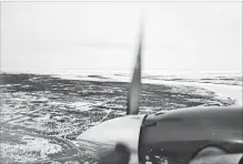  ??  ?? The almost 1,000-kilometre-long Severn River is seen as it reaches Hudson Bay from above Fort Severn. The remote mostly-Cree community has to deal with its own realities.