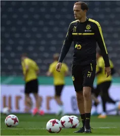  ??  ?? ThomasTuch­el oversees a training session on the eve of the German Cup final match between Eintracht Frankfurt and Borussia Dortmund at the Olympic stadium in Berlin in this May 26, 2017 file photo. — AFP photo