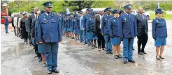  ?? Picture: JON HOUZET ?? PROUD IN BLUE: The recipients of medals in the SAPS Port Alfred Cluster line up for the medal parade at the Port Alfred Civic Centre last Thursday