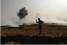  ?? Money Sharma/AFP/Getty ?? A farmer burning straw stubble at Butana in Haryana state, near Delhi. More than 70,000 of these fires were detected in India by satellites this year. Photograph: