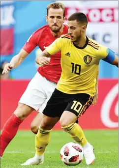  ?? Photo: AFP ?? Belgium’s forward Eden Hazard (R) vies with England’s forward Harry Kane during their Russia 2018 World Cup third place match at the Saint Petersburg Stadium in Saint Petersburg on July 14, 2018
