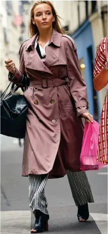  ??  ?? BURBERRY Taupe Burberry trench coat, £1,450, worn with stripy flared trousers