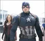  ??  ?? Elizabeth Olsen and Chris Evans in “Captain America: Civil War.”