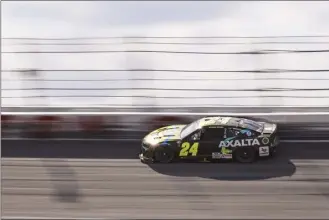  ?? AP photo ?? William Byron competes during the NASCAR Cup Series race at Darlington Raceway on Sunday. Byron moved in front when Ross Chastain and Kyle Larson wrecked while racing for the lead on a restart with six laps left and held off Kevin Harvick in overtime to win the Goodyear 400. The win was Byron’s third this season and seventh of his career. It was also the 100th win for Hendrick Motorsport­s’ No. 24 car and the organizati­on’s first victory at Darlington since Jimmie Johnson won the 2012 race.