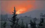  ?? REUTERS ?? Fire and explosions south of Hama city, Syria, on Sunday.