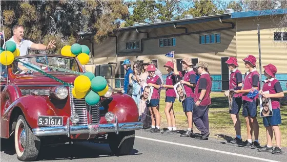  ?? Pictures: Contribute­d ?? The main streets of Allora came alive as the community welcomed home two-time Olympian Matthew Denny.