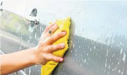  ?? DREAMSTIME ?? With the right approach, you can eliminate your car-wash expenses altogether.