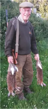  ??  ?? Tony’s evening of sport with his .22 rimfire rifle had a perfect end — three rabbits fit for the pot