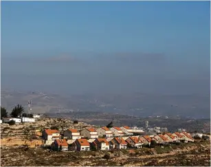  ?? (Baz Ratner/Reuters) ?? THE PALGEI MAYIM outpost, whose residents see it as a neighborho­od of the Eli settlement, is seen in the Binyamin region of the West Bank.