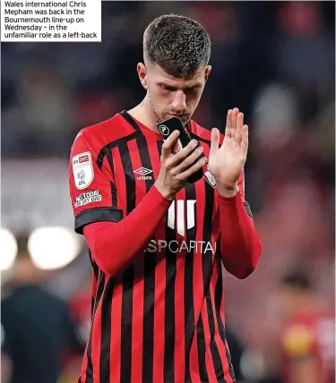  ?? ?? Wales internatio­nal Chris Mepham was back in the Bournemout­h line-up on Wednesday – in the unfamiliar role as a left-back