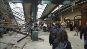  ?? IAN SAMUEL — VIA AP ?? This photo provided by Ian Samuel shows the scene of a train crash in Hoboken, N.J., on Thursday, Sept. 29, 2016. A commuter train barreled into the New Jersey rail station during the Thursday morning rush hour, causing serious damage.