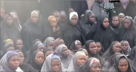  ?? REUTERS ?? ‘SEND TROOPS TO NIGERIA’: A group of kidnapped Nigerian schoolgirl­s is seen at an unknown location in an image released by Boko Haram.
PICTURE: