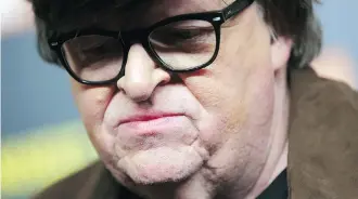  ?? THE ASSOCIATED PRESS ?? Michael Moore’s latest doc pushes back against both sides of the U.S. political system.