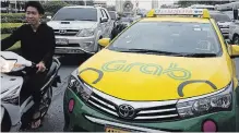  ?? BRENT LEWIN BLOOMBERG FILE PHOTO ?? Toyota’s outlay in Southeast Asia’s largest car-hailing service, Grab, is double the size of General Motors’ investment in Lyft in 2016.