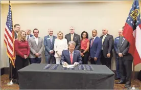  ?? Courtesy — Gov. Brian kemp ?? Gov. Brian Kemp Thursday signed five education bills into law, including measures aimed at bolstering school safety and improving literacy.