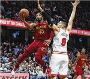  ?? RON SCHWANE / AP ?? Cavaliers guard Donovan Mitchell drives to the basket Monday in Cleveland. Mitchell scored or assisted on 99 points in the game, the second most in a game in NBA history behind Wilt Chamberlai­n in his 100-point game on March 2, 1962 (104).