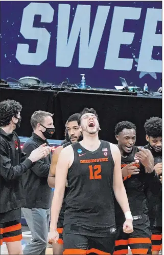  ?? Jeff Roberson The Associated Press ?? Roman Silva and his Oregon State teammates need to beat Houston in the Midwest Region championsh­ip game to become the first No. 12 seed to reach the NCAA Tournament’s Final Four.