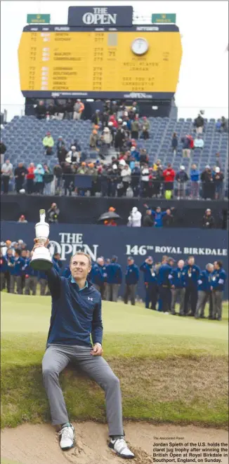  ?? The Associated Press ?? Jordan Spieth of the U.S. holds the claret jug trophy after winning the British Open at Royal Birkdale in Southport, England, on Sunday.