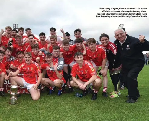  ??  ?? East Kerry players, mentors and District Board officials celebrate winning the County Minor Football Championsh­ip final in Austin Stack Park last Saturday afternoon. Photo by Domnick Walsh